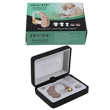 Box labelled Jecpp Hearing Aid above an open black case with a beige behind-the-ear amplifier, ear tips and a button battery, used for the HearingAid Max hard case add-on