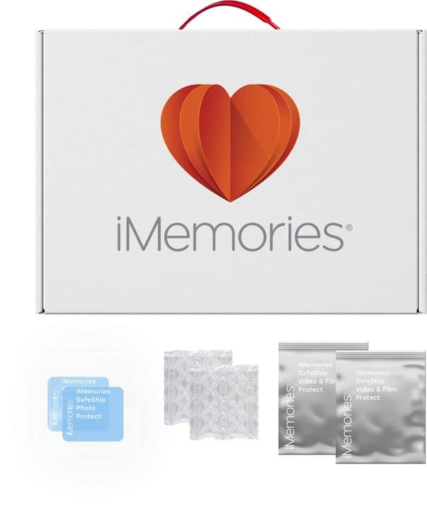 White iMemories SafeShip box with red handle beside waterproof bags and bubble cushions