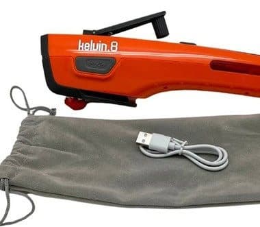 Kelvin 8 lying on its grey drawstring carry pouch with a USB charging cable