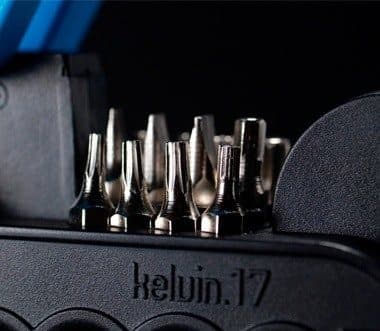 Screwdriver bits stored in the body of the Kelvin 17 multi-tool, with the kelvin.17 logo