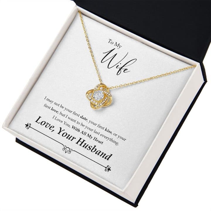 Gold-tone Love Knot Necklace with a clear centre stone on the To My Wife card in an open black and white box