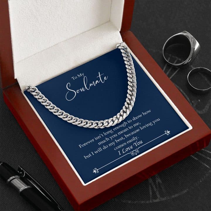 Silver-tone Luxury Cuban Link chain on its To My Soulmate card in an open red-brown mahogany-style box beside two steel rings and a pen