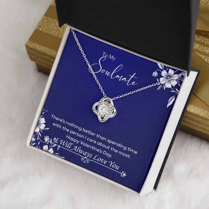 Luxury Love Knot necklace on a navy To My Soulmate card reading Happy Valentine's Day, I Will Always Love You, in a black and white box on white fur