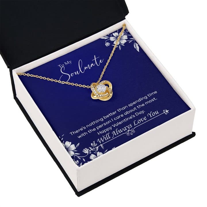 Gold-tone Luxury Love Knot pendant on the navy floral To My Soulmate card in an open black and white box