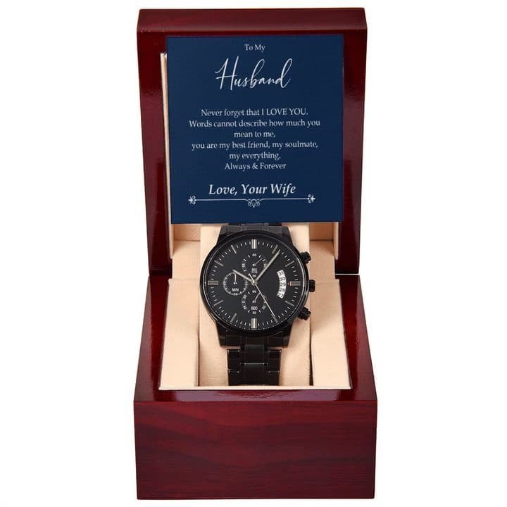 Black Luxury Watch on a cream cushion in a mahogany-style box, with a To My Husband card reading Never forget that I love you, signed Love, Your Wife