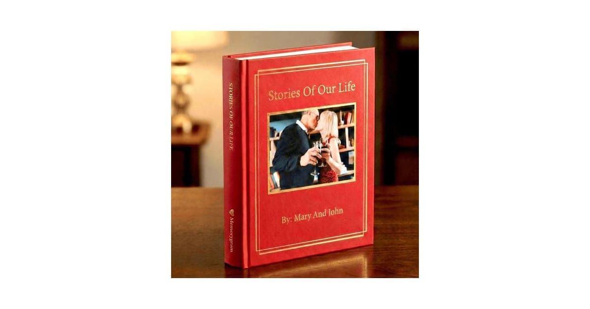 Red Memorygram hardcover book titled Stories of Our Life with a couple's photo on the cover