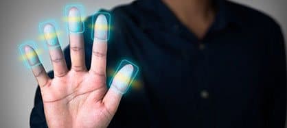 Hand with glowing fingertips against a dark background, illustrating the NanoSecure Multi Fingers Mode add-on