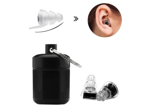 Clear NoiseBudsX triple-flange silicone earplug, a woman's ear with a plug fitted, a black aluminium-look key-ring case and two plugs