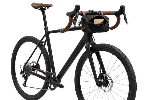 Black gravel bike with a small frame bag, shown as a place to hide an Ondrela tracker