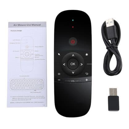 RemoteX Pro laid out with an air mouse user manual, a USB charging cable and a small USB receiver dongle
