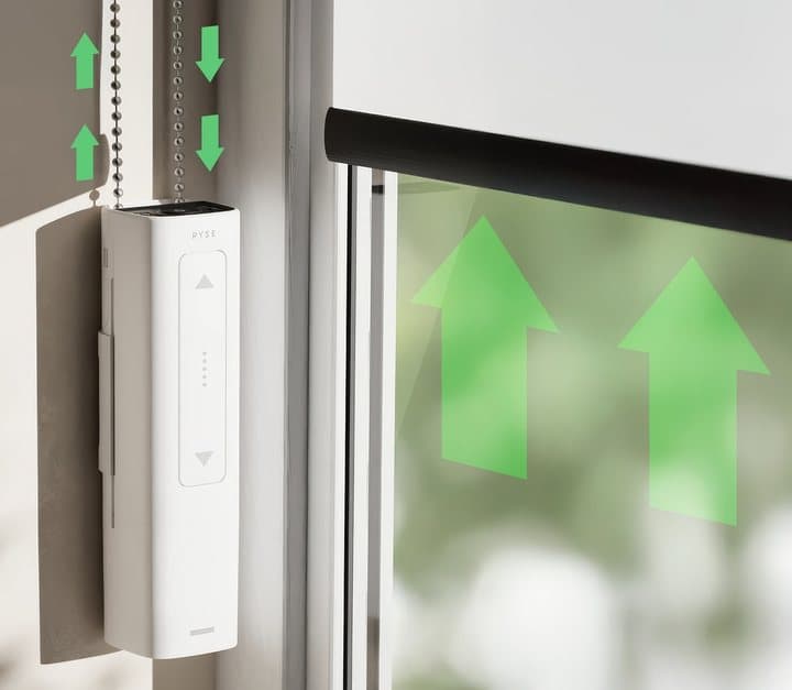 RYSE SmartShade mounted on a window frame with the beaded chain running through it