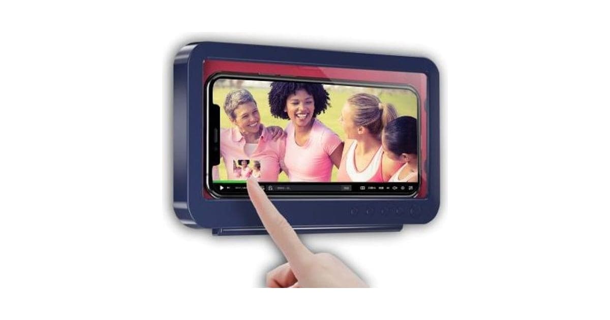 Navy ShowerTime Max wall case holding a phone playing a video, with a finger tapping through the clear cover