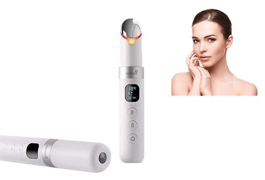 Two white SkinBeautify Pro pens marked WellSkins, one upright with a metal tip, red light and 38 degree display, one lying flat, beside a woman's face