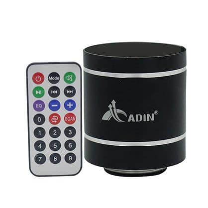 Black cylindrical vibration speaker printed with the Adin logo next to a small white remote control with number, volume and EQ buttons, sold as the SpatialSound Edge remote add-on