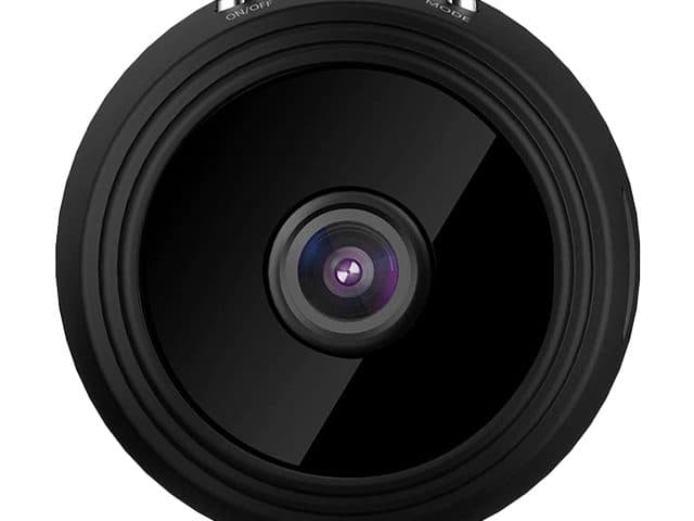 Front view of the SpyRec Pro's round glossy black face with a small central lens and on/off and mode labels on top