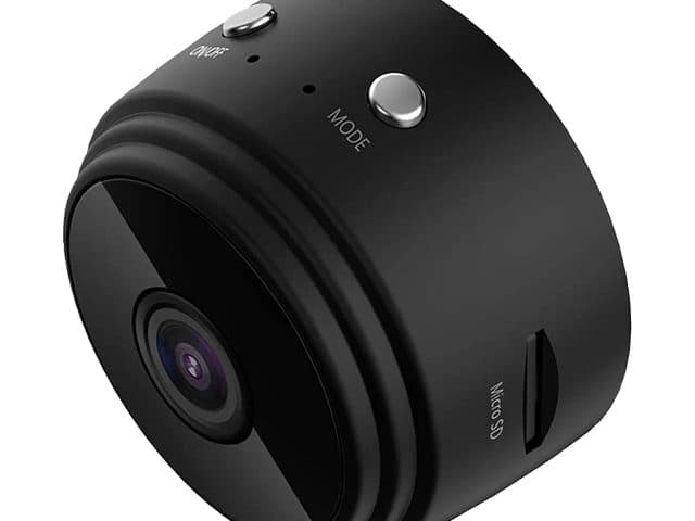 Side view of the black SpyRec Pro showing on/off and mode buttons on top and a microSD card slot on the side