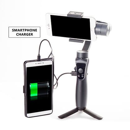 StableCAM PRO gimbal on a small tripod with a cable charging a second smartphone, labelled smartphone charger