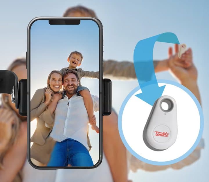 Phone on a Tenikle mount taking a family photo, with a white Bluetooth shutter remote shown
