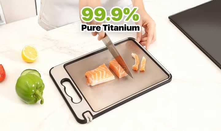 Knife slicing salmon on a TIBO board under a 99.9% Pure Titanium label