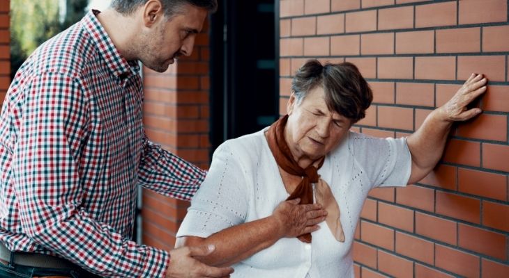 A lady facing difficulty while breathing